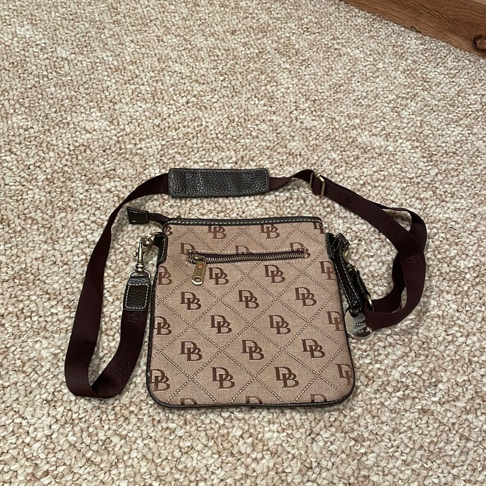 Brand new Dooney & Bourke letter carrier crossbody bag